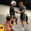 Logo Combat Fitness and masculinity